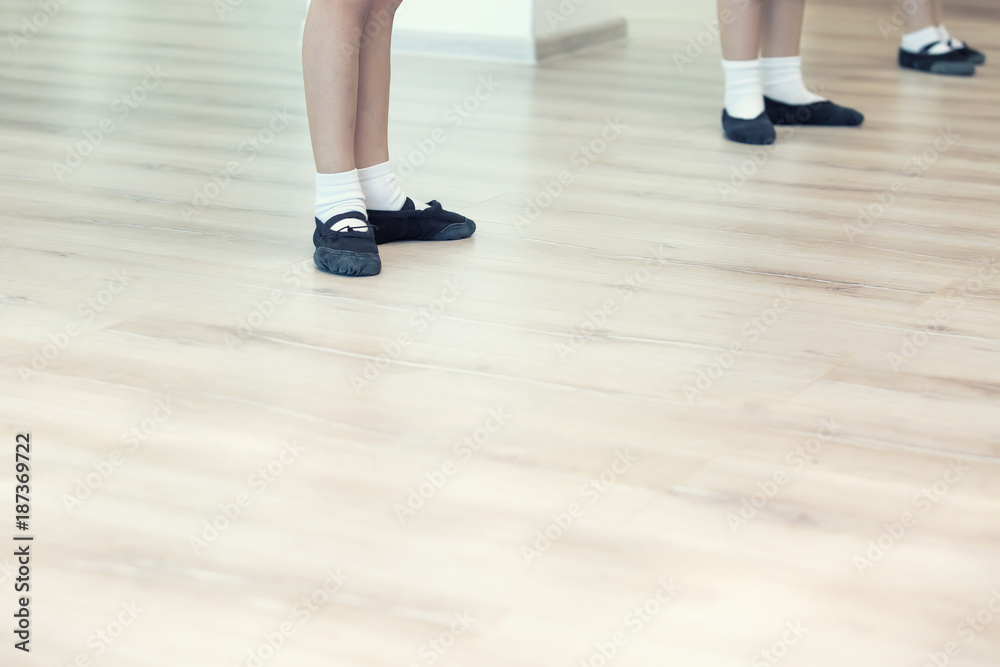 Close Up Of Feet In Children's Ballet Dancing Class