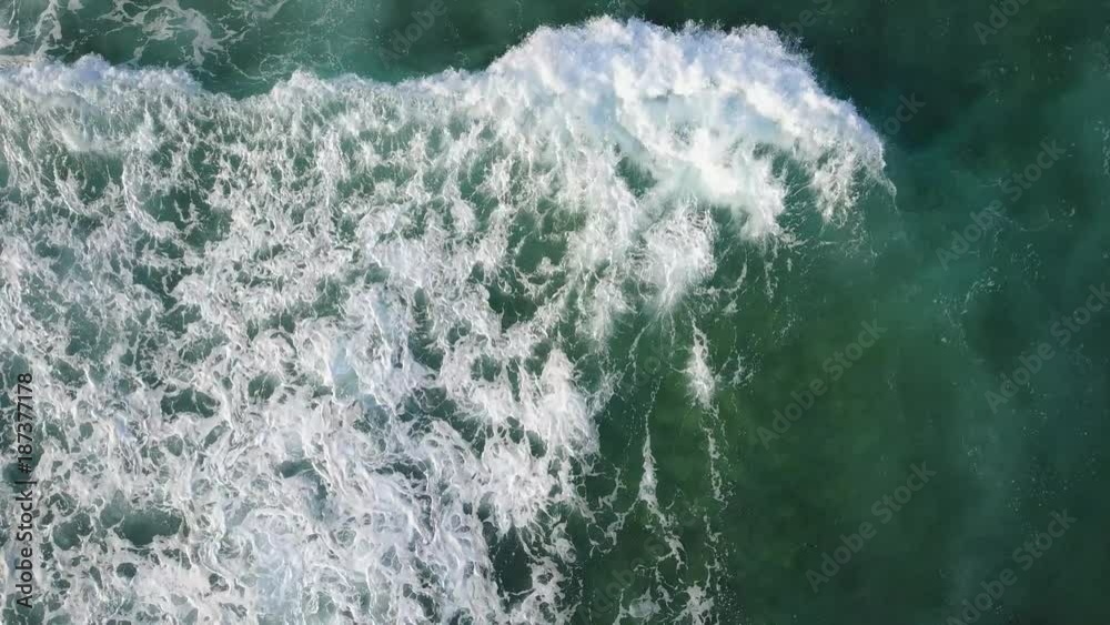 Top view on ocean with waves. Surf spot. Drone fly over water. Green water. Wild ocean. No colour correction. D Log. Drone video. Top view on ocean with waves. Surf spot. Drone fly over water. Green water. Wild ocean. No colour correction. D Log. Drone video.