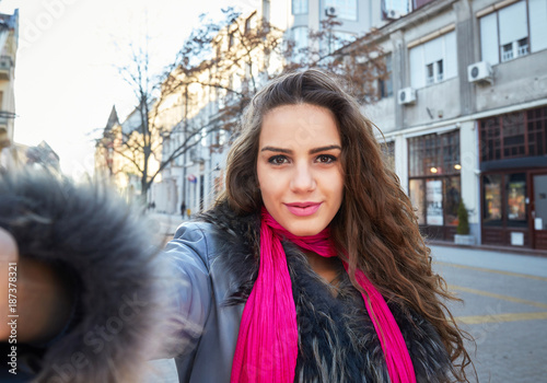 woman taking selfy in winter
