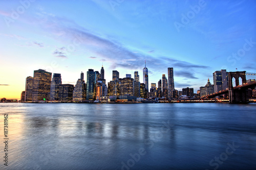 New York City Lower Manhattan with Brooklyn Bridge at Dusk © romanslavik.com