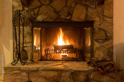 Intimate fire in a stone fireplace