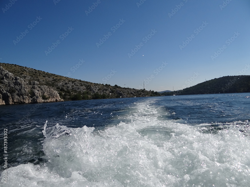 Wake of the luxury motor yacht sailing on the waters of Croatia Wake of the luxury motor yacht sailing on the waters of Croatia
