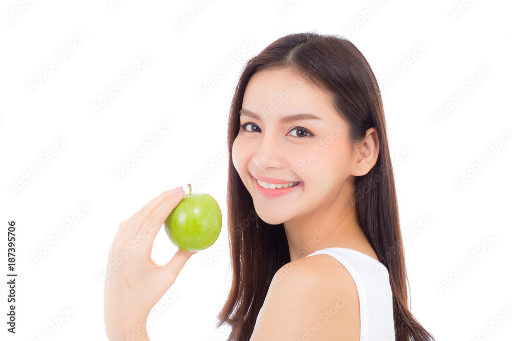 Beautiful young asian woman smile and holding green apple fruit with wellness and healthy isolated on white background. Beautiful young asian woman smile and holding green apple fruit with wellness and healthy isolated on white background.
