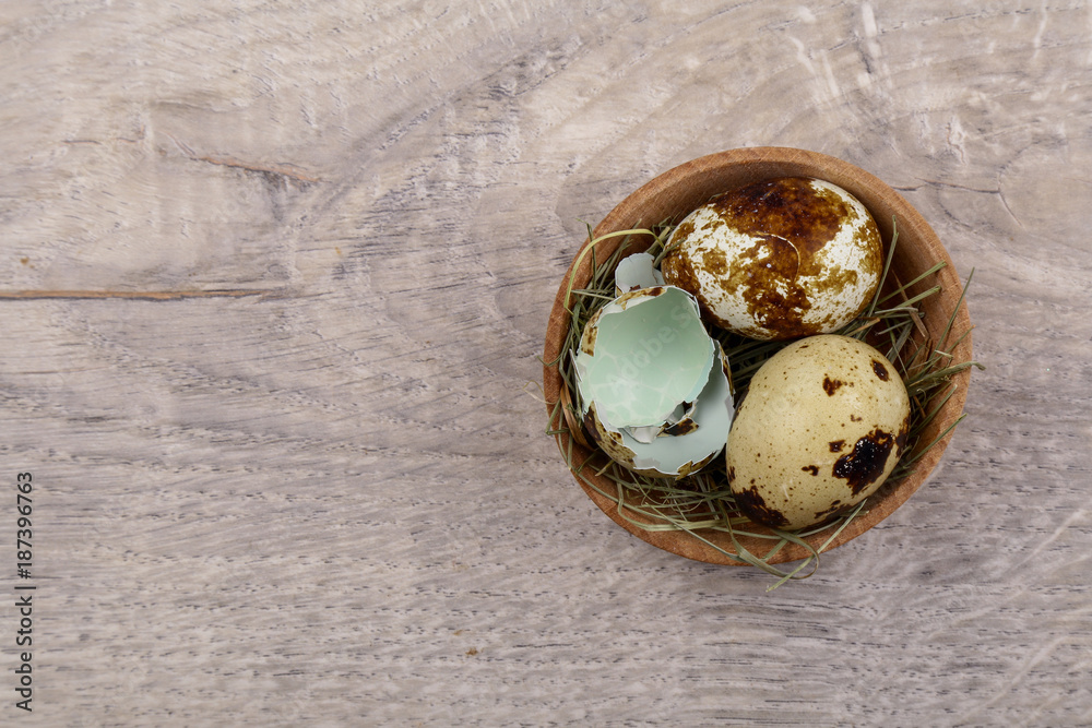 Quail eggs and eggshell on a wooden background. Quail eggs and eggshell on a wooden background.