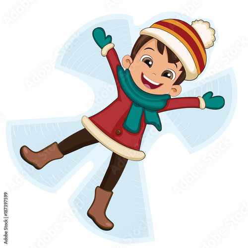 Boy making angel in the snow