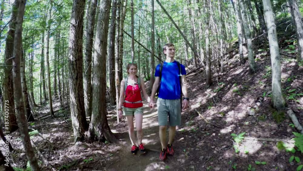 Couple walking in the forest Couple walking in the forest