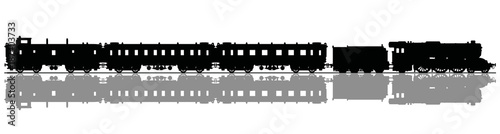 The black silhouette of a vintage passenger steam train