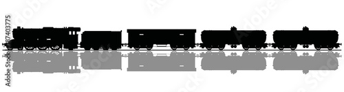 The black silhouette of a vintage freight steam train