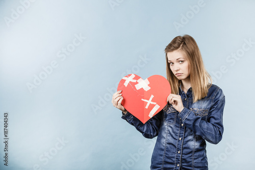 Young woman with broken heart