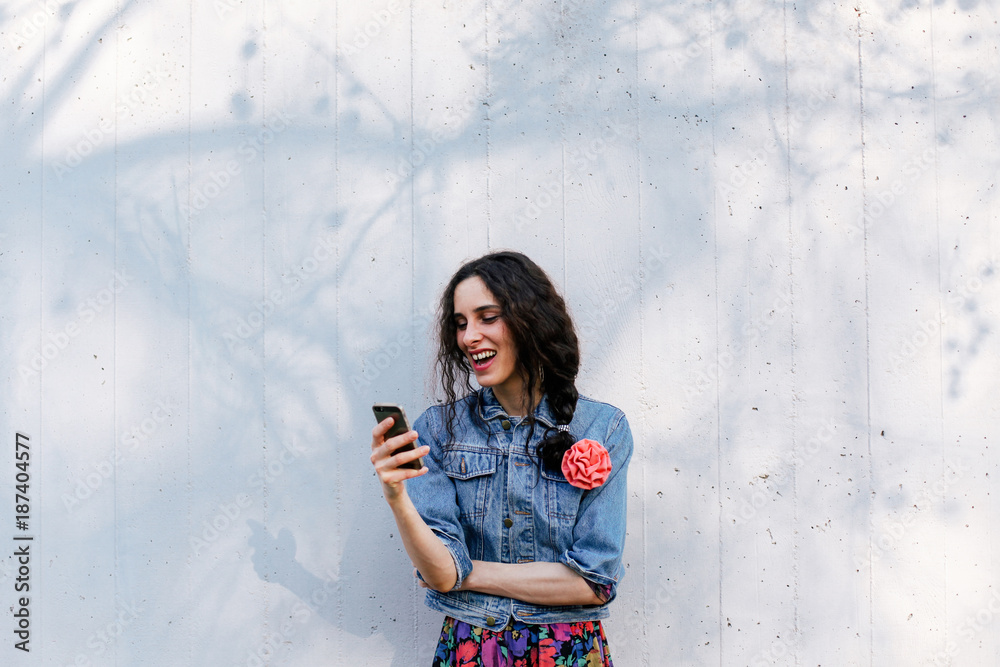 Happy woman using her smart phone Happy woman using her smart phone