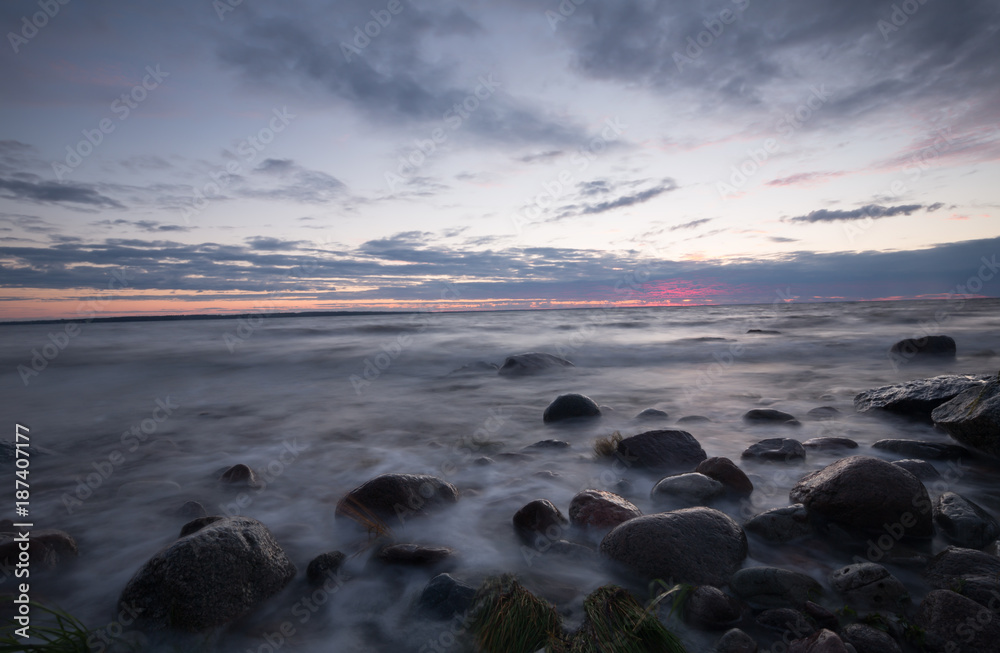 Sunset over a rocky coastline, baltic sea