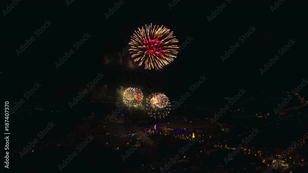 aerial shot : firework celebration over city downtown aerial shot : firework celebration over city downtown