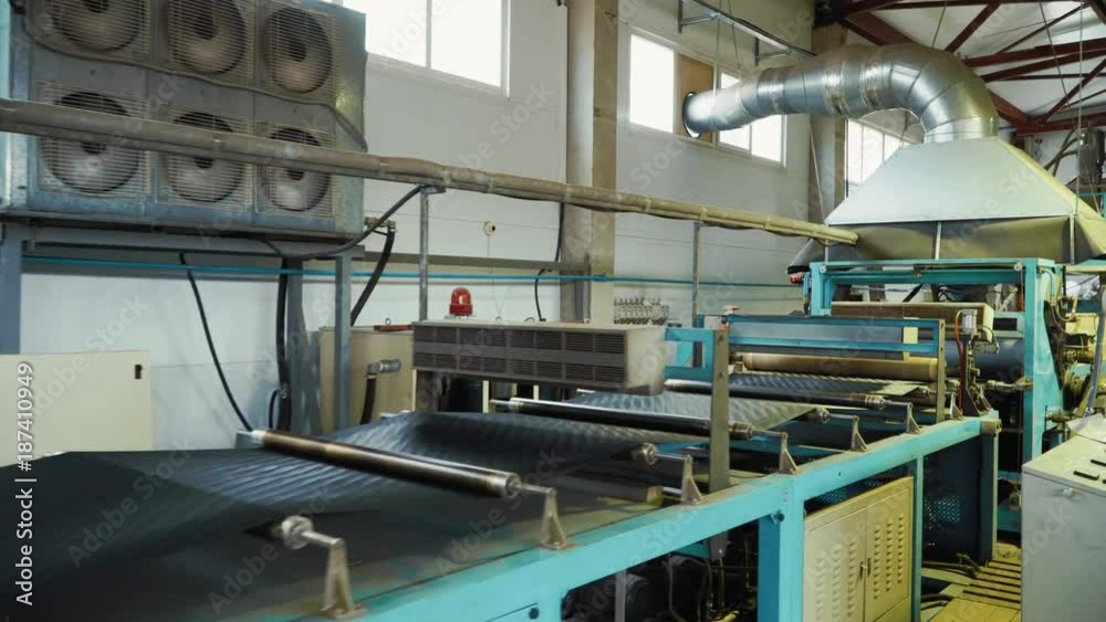 The production of the geogrid in the machine in the plant. The production of the geogrid in the machine in the plant.