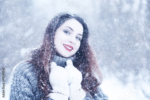 Beautiful girl in a beautiful winter snow