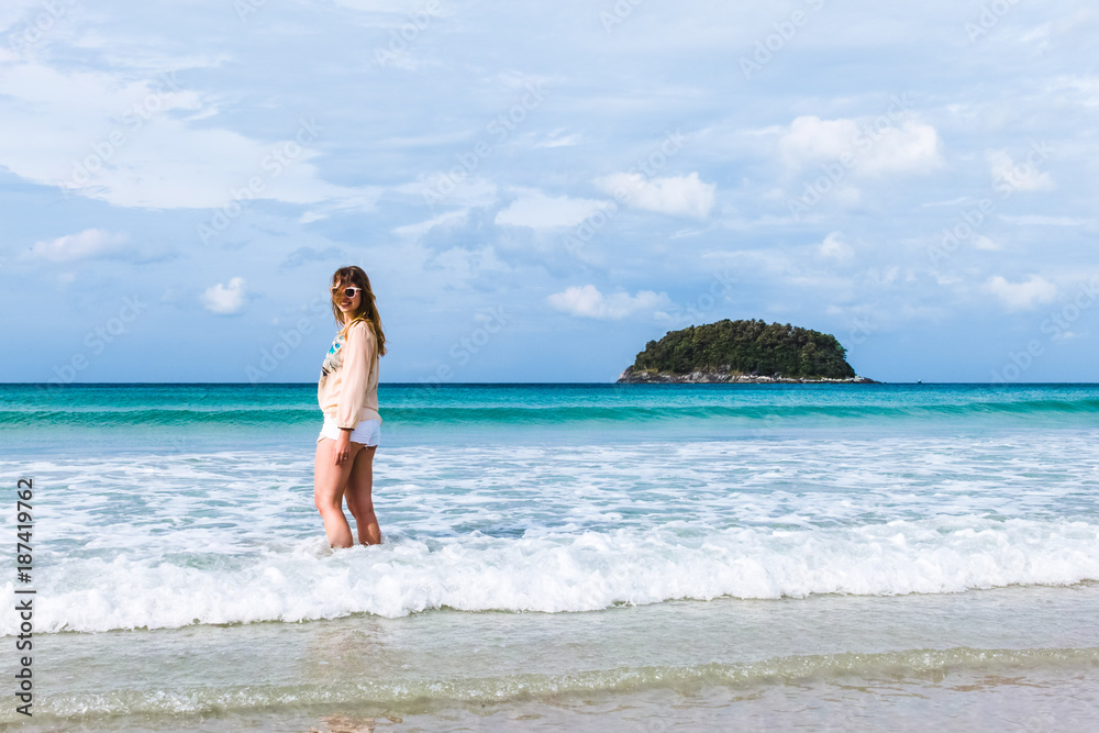 Girl at Kata Beach in Phuket Island, Thailand Girl at Kata Beach in Phuket Island, Thailand