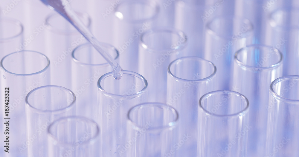 Scientist testing in laboratory for analysis or researching Scientist testing in laboratory for analysis or researching