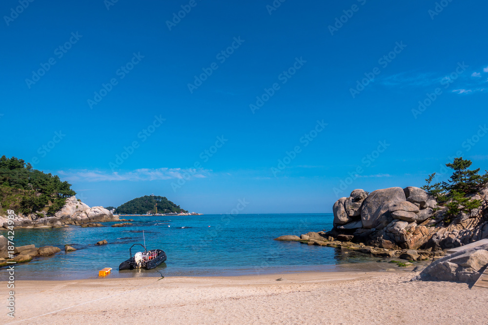 Beach scenery with boats