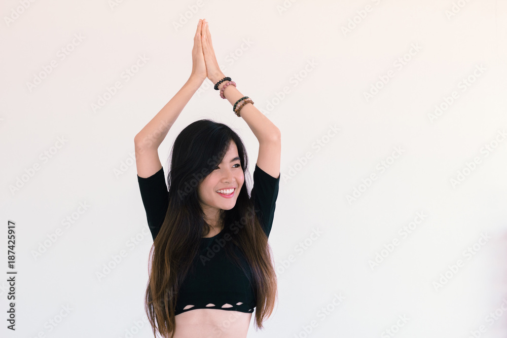 Fashion Portrait of Young cute asian woman wearing crop top and do yoga  pose Stock-Foto | Adobe Stock