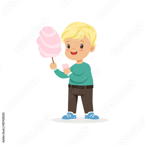 Little blond boy with sweet cotton candy. Cartoon kid character wearing green sweater and brown pants. Flat vector design