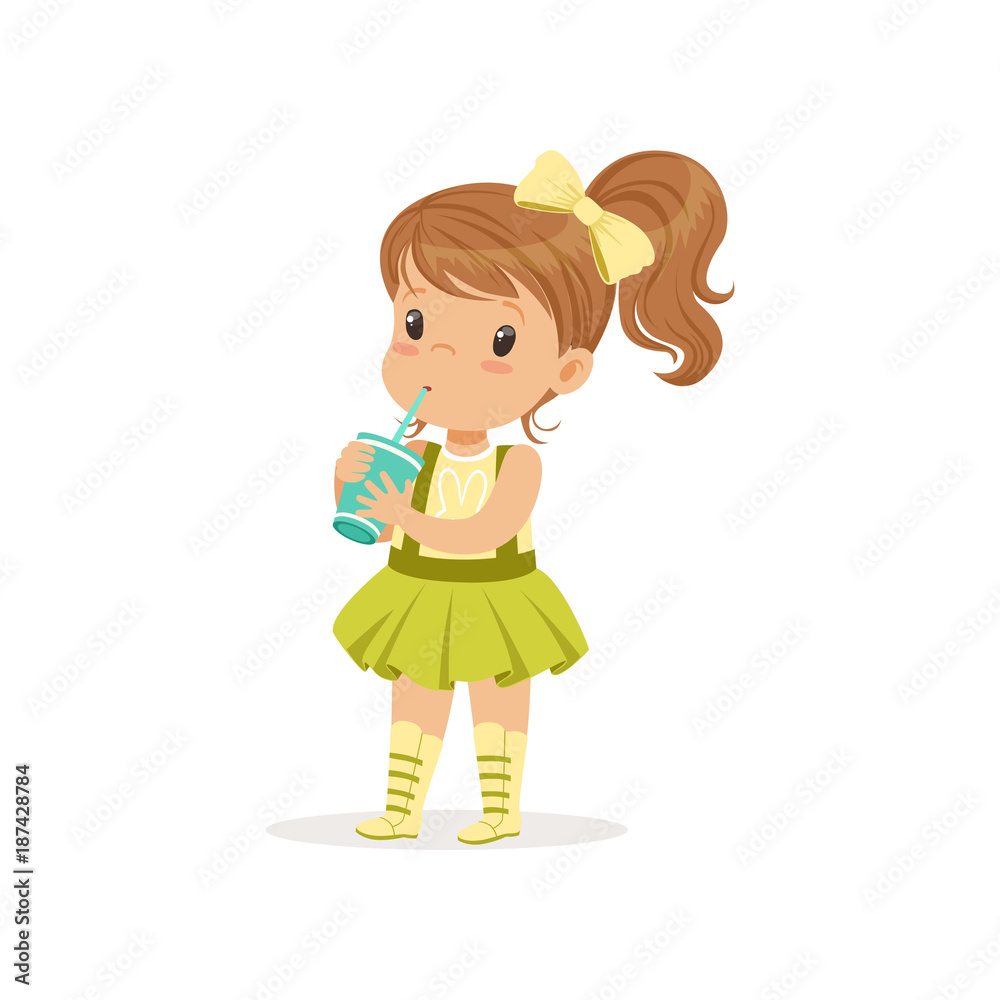 Cute brown-haired girl drinking her refreshing cocktail. Cartoon kid character in t-shirt with bunny print and green skirt with suspenders. Flat vector design