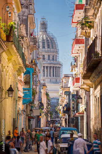 Havana, Cuba, El Capitolio seen from a narrow street