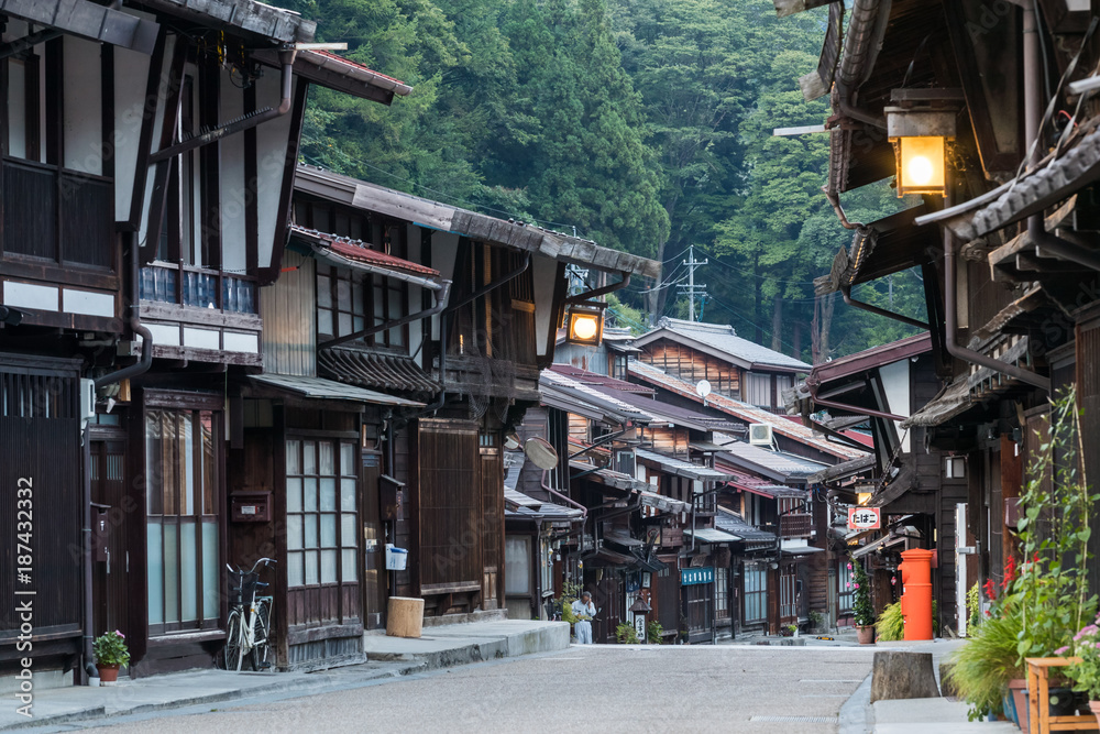 Narai-juku, Japan - September 4, 2017: Picturesque view of old Japanese town with traditional wooden architecture. Narai-juku post town in Kiso Valley, Japan