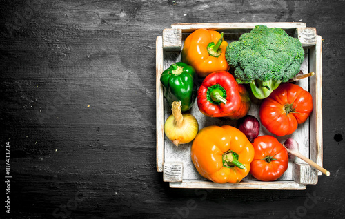 Fresh vegetables in a small box.
