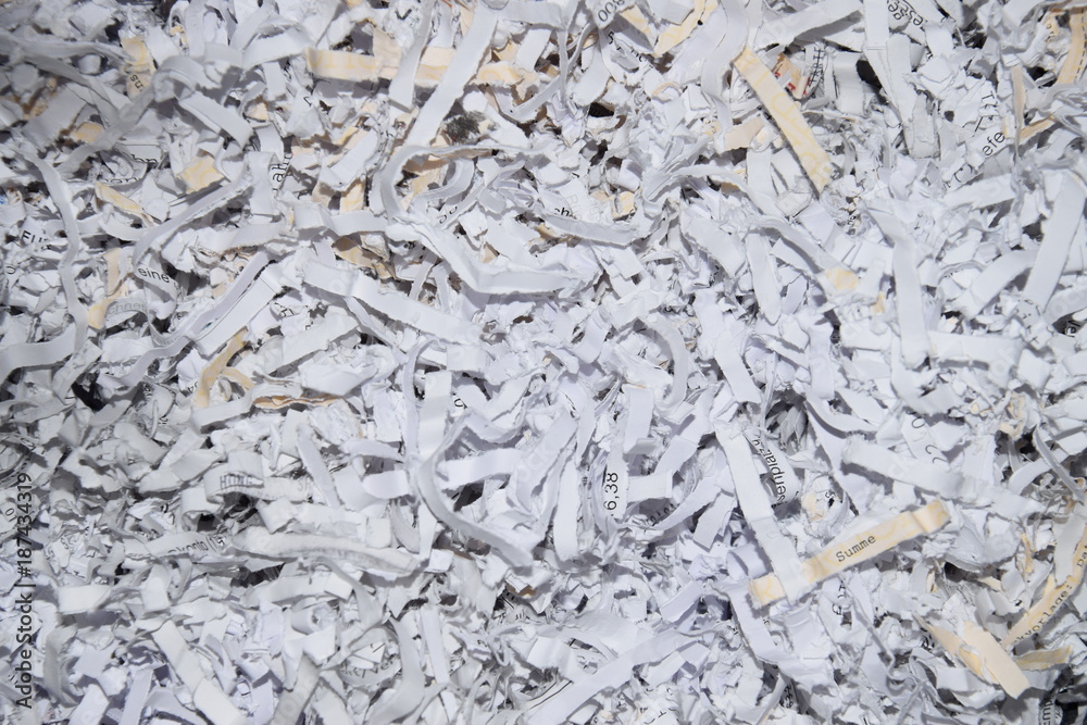scraps of paper made in an office document shredder