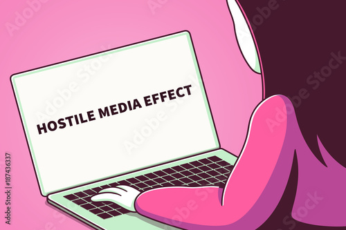 Φωτογραφία Woman looking at a laptop screen with the words hostile media effect
