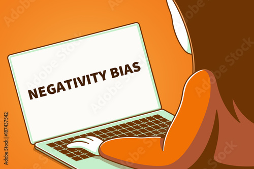 Canvas Print Woman looking at a laptop screen with the words negativity bias