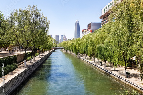 The city Moat that runs around the old city of Jinan, connecting Daming Lake, Quancheng Square and the famous Baotou Spring photo