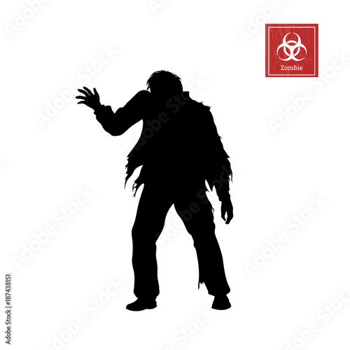 Black silhouette of zombie on white background. Isolated image of undead monster