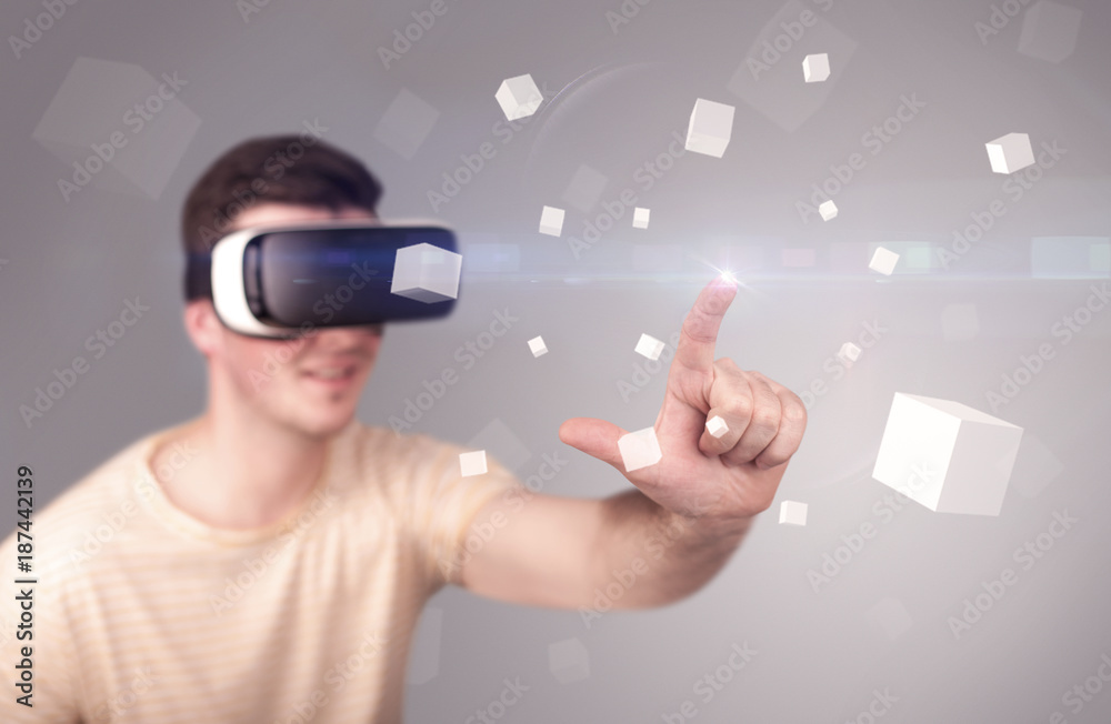 Man wearing virtual reality goggles Man wearing virtual reality goggles