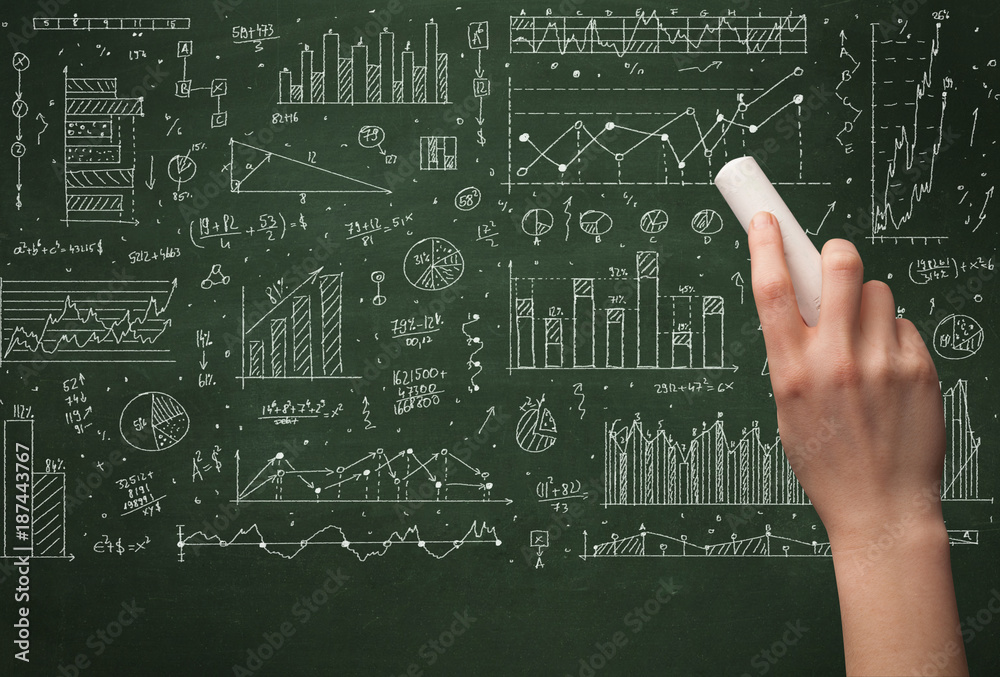 A business person drawing data on chalkboard A business person drawing data on chalkboard