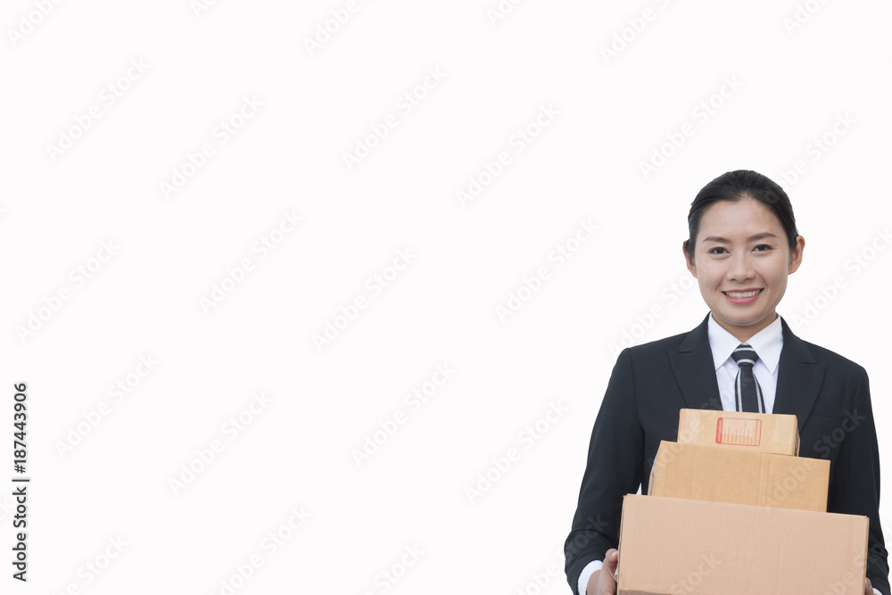 Isolated smart woman carrying boxes on white background Isolated smart woman carrying boxes on white background