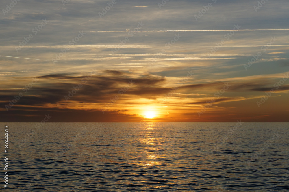 sunrise at the edge of the mediterranean sea