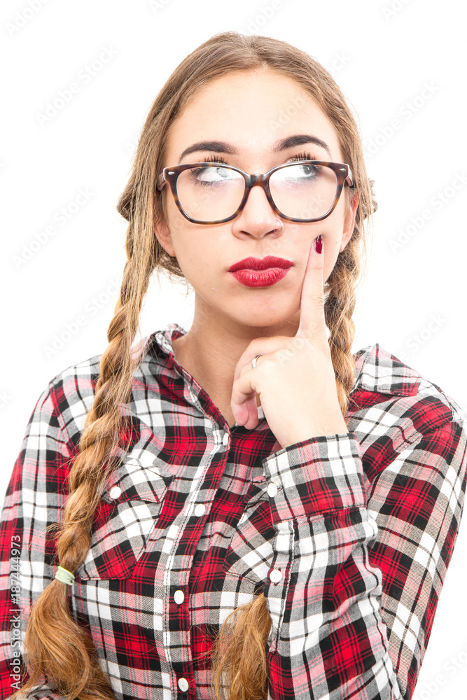 Healthy young thinking woman in glasses