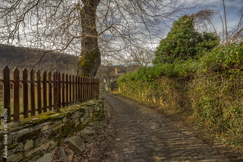 Beauty view at old stone street and fence in ancient village