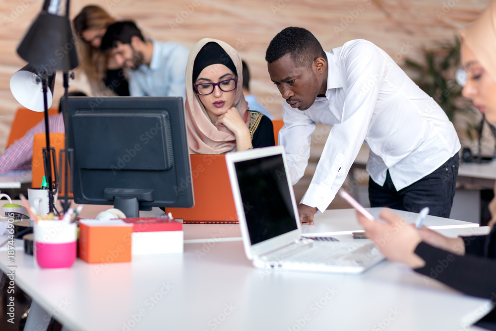 Young business people working at office on new project. startup, concept , team Young business people working at office on new project. startup, concept , team