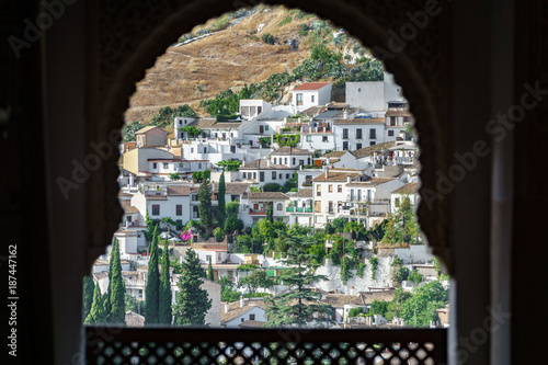 Albaicin neighborhood through door frame of Alhambra photo