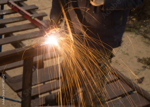 Sparks from welding at the construction site