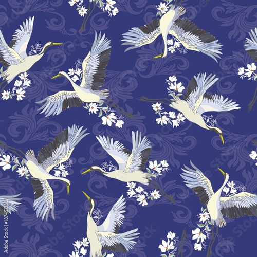 Japanese seamless pattern of birds and water. Traditional vintage fabric print. White and blue indigo background. Kimono design. Monochrome vector illustration.