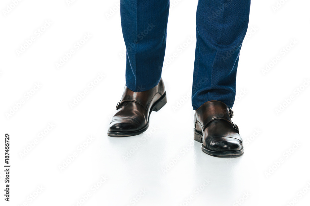 partial view of man in shoes isolated on white