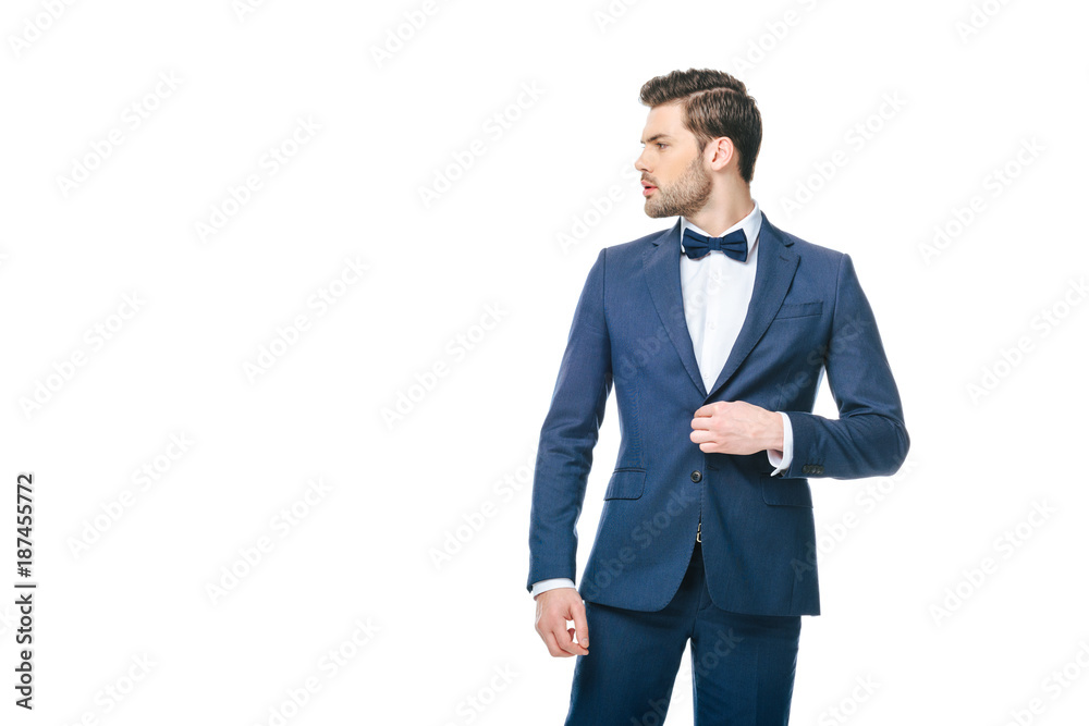 portrait of young man in fashionable suit looking away isolated on white portrait of young man in fashionable suit looking away isolated on white
