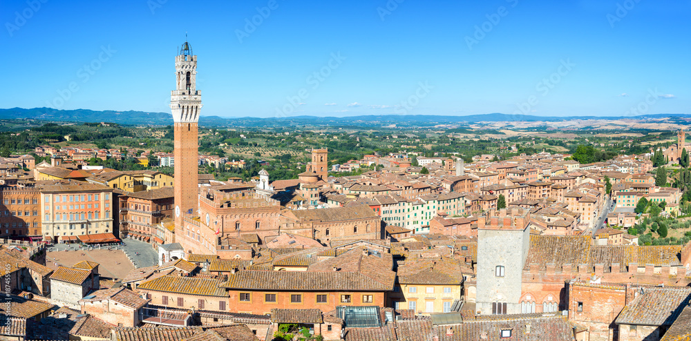 Panorama of Siena, aerial view with the Torre del Mangia (Mangia Tower) and Piazza del Campo (Campo square) , Tuscany, Italy