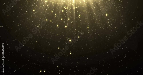Abstract gold glitter particles background with shining stars falling down and light flare or glare overlay effect above for luxury premium product design or award template backdrop. Magic radiance photo