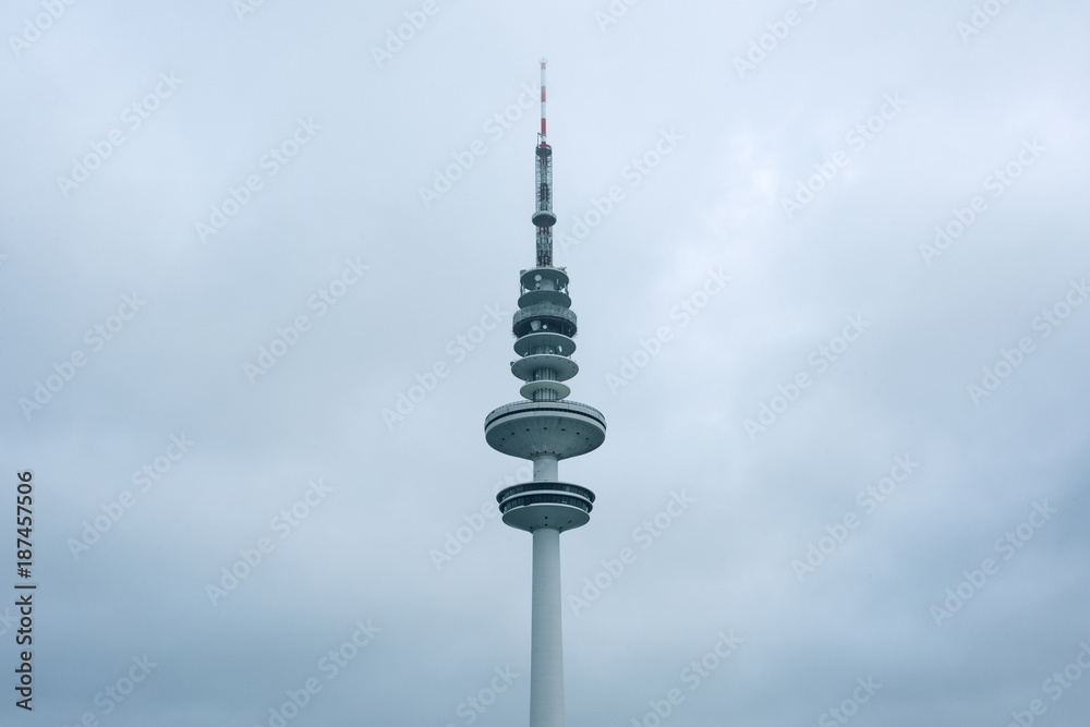 Germany, Hamburg: Telecommunication Tower in foggy and cloudy sky - Heinrich Hertz Tower. 