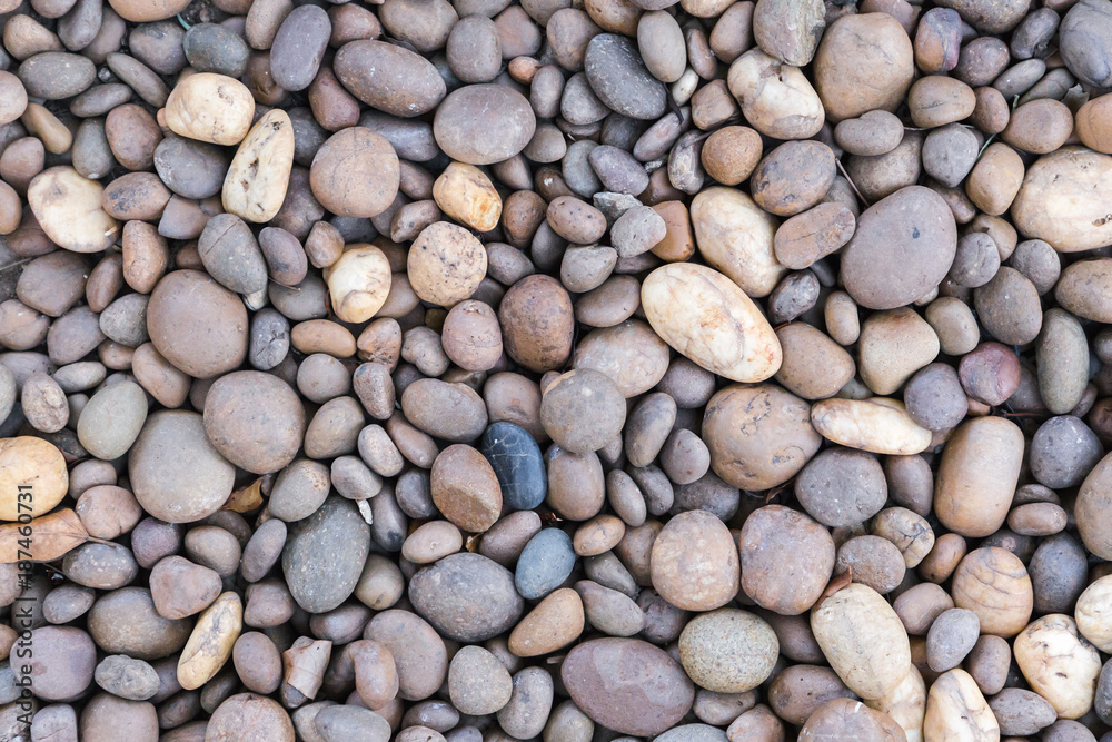 Stone pebbles texture or stone pebbles background for interior design business. exterior decoration and industrial construction idea concept design. Stone pebbles motifs that occurs natural. Stone pebbles texture or stone pebbles background for interior design business. exterior decoration and industrial construction idea concept design. Stone pebbles motifs that occurs natural.