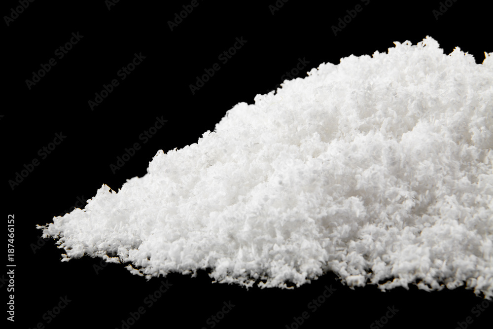snow on a black background close-up snow on a black background close-up
