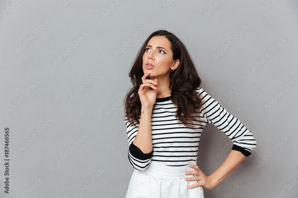 Portrait of a thoughtful woman looking away at copy space Portrait of a thoughtful woman looking away at copy space